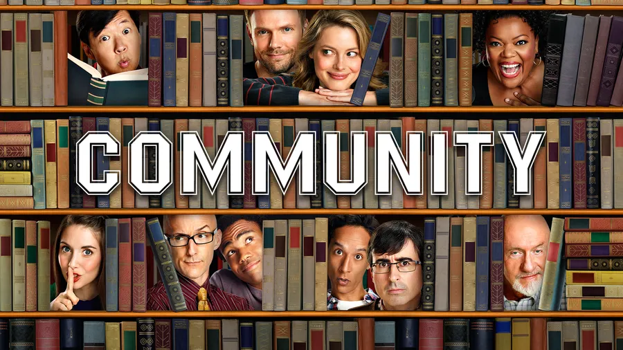 community wallpaper title bookshelves with cast of characters