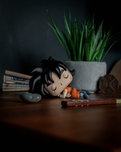 scott-gummerson-_5Q1-ae44aw-unsplash sleeping funko pop son goku on a desk