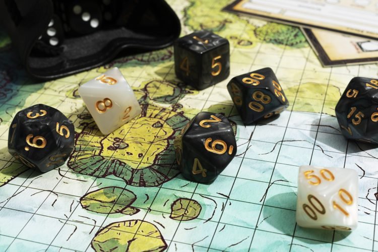 still-life-map-with-dices dungeons and dragons dice on map