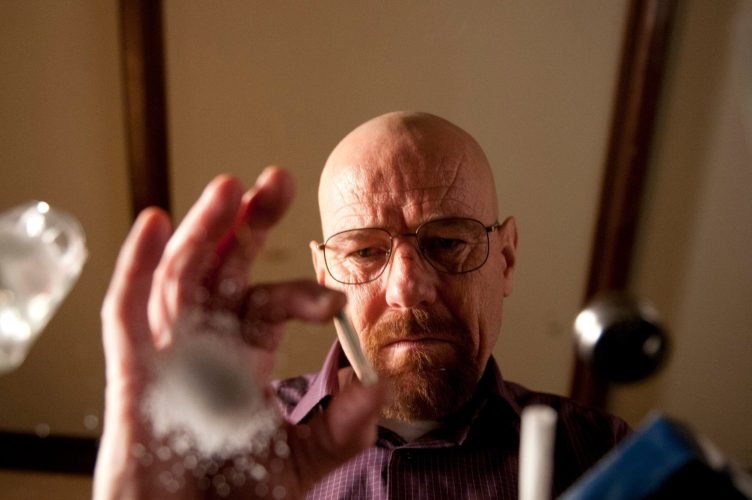 walter white drugs walter white bryan cranston looking at drugs on glass tabletop